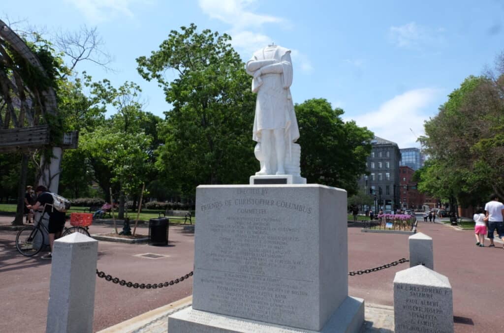 decapitated statue of Columbus